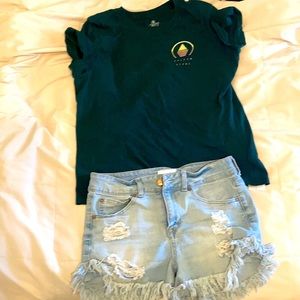 Volcom Women’s T-shirt and mid rise jeans shorts.